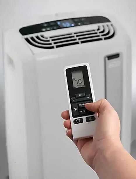 DeLonghi 12,000 BTU (ASHRAE) 6,700 BTU (DOE) 500 Sq. ft. Pinguino Portable Air Conditioner, FOB KS