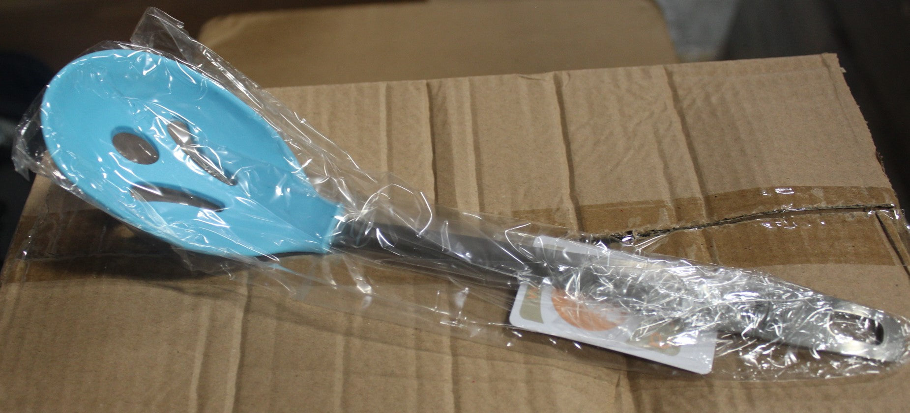 Sara Cucina 30cm Slotted Spoon with a silicone head and a stainless steel handle. Heat resistant up to 230 degrees.